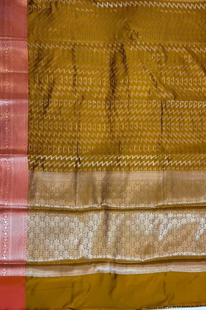 Banarasi Semi Silk Saree In Mustard Colour With ZigZag Zari Work