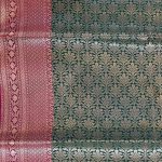 Banarasi Semi Silk Saree In Bottle Green Colour With Silver Zari ZigZag Work